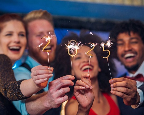 People celebrating the new year with sparklers